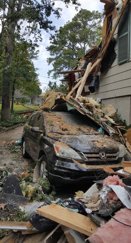 Emergency tree removal after storm damage to property